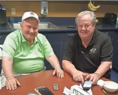  ?? TOM HAUDRICOUR­T / MILWAUKEE JOURNAL SENTINEL ?? Bruce Froemming (left) and Joe West have both umpired more than 5,000 major-league games. Bill Klem is the only other umpire to surpass that mark.