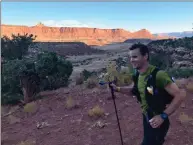  ??  ?? Although he was tired and sore, Justin couldn’t help but appreciate the majestic views Utah afforded. He said much of the course was desert but he also ran through Alpine forests, up hills and down into sandy valleys.