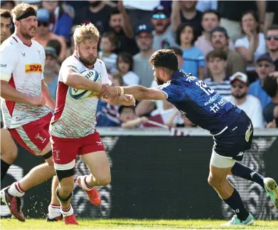  ?? ?? History man: Tyrone Green goes past Romain Buros to score Harlequins sixth try