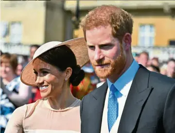  ??  ?? The new Duke and Duchess of Sussex, Prince Harry and Meghan Markle, having broken barriers and convention, are expected to pave the way for change. — AFP