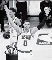  ?? ASSOCIATED PRESS ?? BOSTON CELTICS’ JAYSON TATUM celebrates winning the NBA All-Star skills session contest Saturday in Charlotte, N.C.