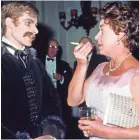  ?? GETTY IMAGES ?? She chats with David Wall, a dancer with the Royal Ballet, in 1978 after the premiere of “Mayerling.”