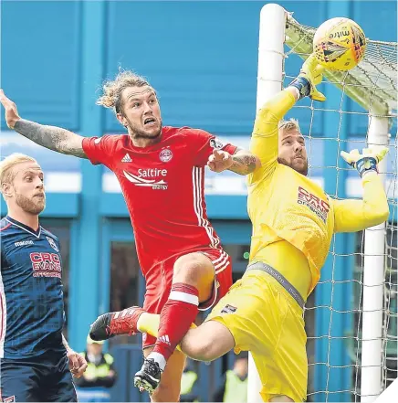  ??  ?? ■ New Aberdeen signing Stevie May and challenges County keeper Scott Fox.