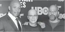  ?? THE ASSOCIATED PRESS ?? Dr. Dre, Jimmy Iovine and director Allen Hughes at the première of HBO’s The Defiant Ones in New York last week.