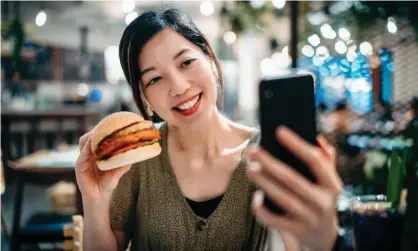  ?? ?? ‘Your food always gets cold, because it takes for ever to curate a photo of it.’ Photograph: d3sign/Getty Images (posed by a model)