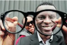  ?? JULIE OLIVER/OTTAWACITI­ZEN ?? Ottawa-based Bôhten CEO and founder, Nana Osei, wears his stylish glasses — made from reclaimed wood in Africa. He appeared on Dragon’s Den on Nov. 13 to promote his eco-luxury eyewear line.