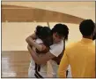  ?? PAUL DICICCO — FOR THE NEWS-HERALD ?? Asia Nicholson (left) and Zennia Thomas of Brush celebrate the Arcs’ 57-42win over Kenston on Feb. 3.