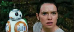  ?? LUCASFILM PHOTOS ?? Daisy Ridley, as Rey, and droid BB-8 appear in a scene from “Star Wars: The Force Awakens.”