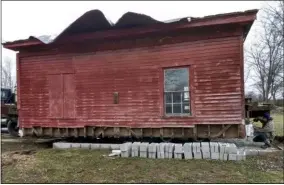  ?? SUBMITTED ?? The one-room schoolhous­e needs structural repairs because of rotted sections underneath, says Jim Klier of Klier Structural Movers, who on Jan. 16moved the structure.