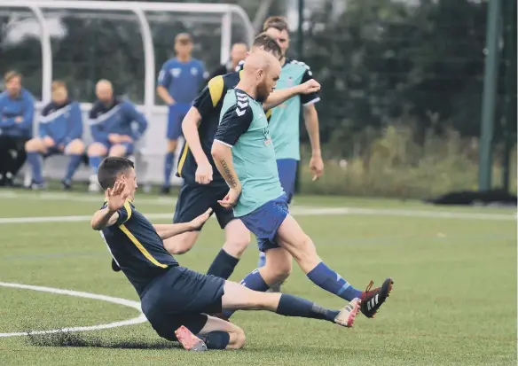  ??  ?? Northern League action between Washington (dark blue) and Jarrow FC at Ford Hub Sports Complex, Sunderland, on Saturday.