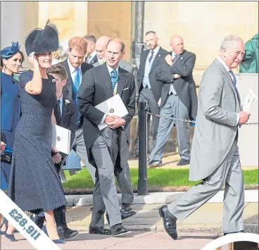  ??  ?? Costof getting Prince Charles, main with Meghan Markle, Sophie, Countess of Wessex, Prince Harry and Prince Edward, to Windsor Castle for wedding of his niece, Princess Eugenie, and Jack Brooksbank, below, last October