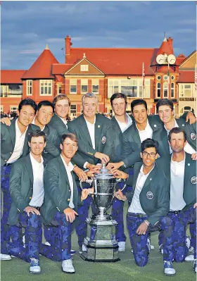  ??  ?? Raiding party: The US team show off the Walker Cup after their final-day heroics