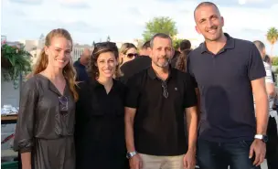  ?? (Eylon Yehiel) ?? SHIN BET director Nadav Argaman (second from right) with TAU Ventures managing partner Nimrod Cohen (right) and company staff.