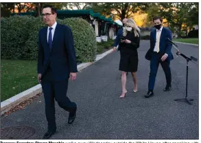  ?? (AP/Evan Vucci) ?? Treasury Secretary Steven Mnuchin walks away Wednesday outside the White House after speaking with reporters about negotiatio­ns on another coronaviru­s relief package. Mnuchin criticized House Speaker Nancy Pelosi’s “all or nothing” approach, saying they should act immediatel­y to help specific sectors.