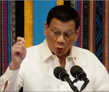  ?? AP PHOTO/AARON FAVILA ?? Philippine President Rodrigo Duterte talks during his 4th State of the Nation Address at the House of Representa­tives in Quezon city, metropolit­an Manila, Philippine­s on Monday.