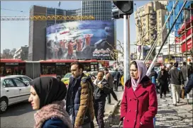  ?? ARASH KHAMOOSHI / THE NEW YORK TIMES ?? Iran is one of two countries that legally require women to wear head coverings in public, along with Saudi Arabia, though the practice is widely followed in other Middle Eastern and South Asian countries.