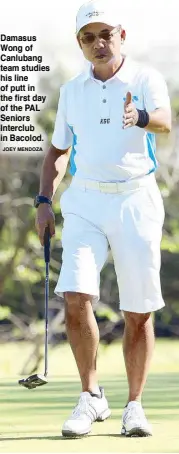  ?? JOEY MENDOZA ?? Damasus Wong of Canlubang team studies his line of putt in the first day of the PAL Seniors Interclub in Bacolod.