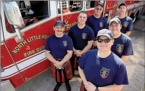  ?? Arkansas Democrat-Gazette/STATON BREIDENTHA­L ?? Seven North Little Rock firefighte­rs have formed the North Little Rock Fire Fighters Pipes & Drums Corps. They are (from left) Aaron Henderson, Lt. Josh Cox, Capt. Alan Tetkoskie, Corey Platt, Sean Walker and Lt. Mark Wittenburg. Charlie Hobson is not...