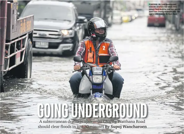  ??  ?? POWERING ON: Land developmen­t, concrete structure has taken away natural flood draining land and natural pond from Chaeng Watthana area. The road is notorious for its flash flood.