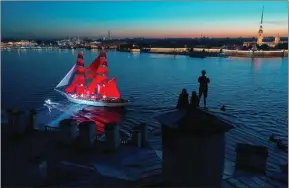  ??  ?? The Rossiya brig rehearses for the 2021 Scarlet Sails Festival in St Petersburg