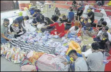  ?? PRAFUL GANGURDE/HT PHOTO ?? Mission Konkan Team with supplies to be distribute­d to Mahad villagers affected by the recent floods.