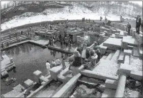  ?? Courtesy photo ?? Crowds gather in 1977 to see the Pyramid built by William Hope “Coin” Harvey. The remains of his great time capsule usually are hidden under the water of Beaver Lake. But when lake levels are low, people visit the site.