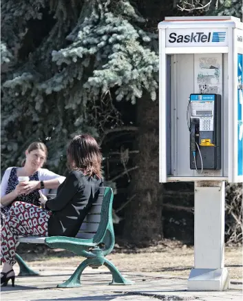  ?? GORD WALDNER/FILES ?? The rise of cellphones has led to a substantia­l decline in pay phones. Despite that, a SaskTel official says there is no plan to eliminate pay phones, which still serve some customers and generate revenue.