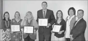  ?? Doug Walker / Rome News-Tribune ?? Celebratin­g completion of the Georgia Academy for Economic Developmen­t program are Carrie Barnes (from left), Georgia EMC’s; Floyd County representa­tives Alyson Lansdell,
Jeanne Krueger, Brice Wood and Kristi Kent; Elyse Davis, Georgia Power; and...