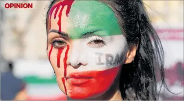  ?? PHOTO / AP ?? A woman protests Rome against the death of Mahsa Amini, who died in police custody in Iran.