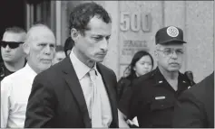  ?? ASSOCIATED PRESS ?? FORMER CONGRESSMA­N ANTHONY WEINER sentencing Monday in New York. leaves federal court following his HOW WILL THE NEW POLICY AFFECT THE CASE?