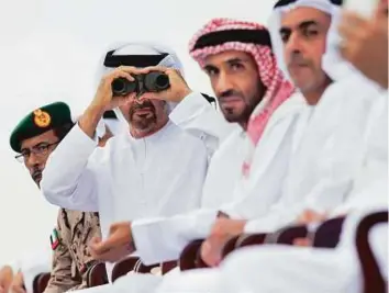  ?? WAM ?? Shaikh Mohammad Bin Zayed, Lt Gen Shaikh Saif, Shaikh Nahyan Bin Zayed and Lt Gen Hamad Mohammad Thani Al Rumaithi watching the military demonstrat­ion yesterday.