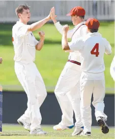  ??  ?? BREAKTHROU­GH: North Hobart opening bowler Ben Fraser celebrates the wicket of Jesse Dinnie yesterday.