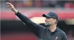  ?? AFP ?? Liverpool manager Juergen Klopp gestures during a match.