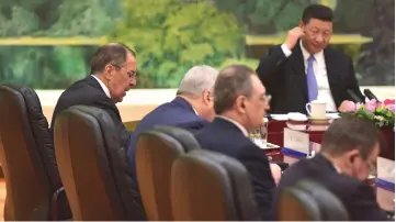  ??  ?? Lavrov attends a meeting with Xi at the Great Hall of the People in Beijing. — Reuters photo