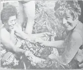  ?? Picture: FILE ?? Helen McGirr of New Zealand helps fill a sulu with small fish.