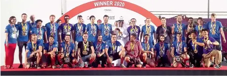  ?? Photo by Ashwani Kumar ?? SHOW OF EXCELLENCE: Winners of the Mohamed Bin Zayed Internatio­nal Robotics Challenge with officials in Abu Dhabi. —