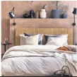  ??  ?? Go natural: Elaktig rattan headboard, here in a standard king, £106, Ikea