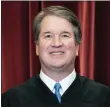  ?? ERIN SCHAFF/THE NEW YORK TIMES VIA AP, POOL ?? Associate Justice Brett Kavanaugh stands during a group photo at the Supreme Court in Washington on April 23.