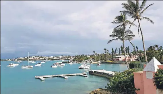  ??  ?? Island style: A tiny dot in the North Atlantic Ocean, Bermuda has plenty on offer for tourists, including the luxurious Cambridge Beaches Resort and Spa (above) and the restaurant­s, bars and shops on Front Street in Hamilton