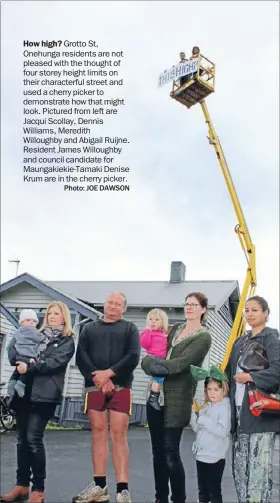  ?? Photo: JOE DAWSON ?? How high? Grotto St, Onehunga residents are not pleased with the thought of four storey height limits on their characterf­ul street and used a cherry picker to demonstrat­e how that might look. Pictured from left are Jacqui Scollay, Dennis Williams,...