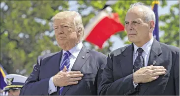  ?? SUSAN WALSH / AP ?? President Donald Trump and former Homeland Security Secretary John Kelly listen to the national anthem during commenceme­nt exercises at the U.S. Coast Guard Academy in New London, Conn., in May. Trump moved July 28 to overhaul his senior team,...