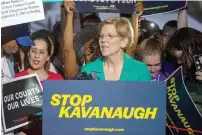  ?? AFP ?? Senator Elizabeth Warren speaks to protesters in front of the Supreme Court in Washington. Liberals protested against Trump’s nomination of Brett Kavanaugh to the Supreme Court.—