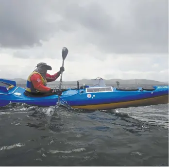  ?? David Barlow ?? Richard Barnes heading out from Tasmania on day one of his epic journey.