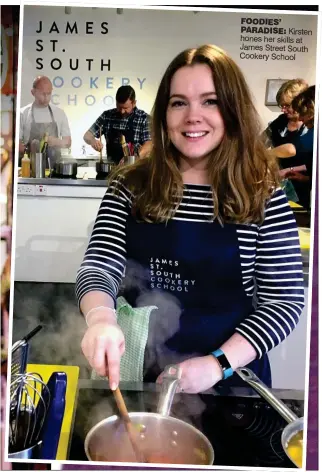  ??  ?? FOODIES’ PARADISE: Kirsten hones her skills at James Street South Cookery School