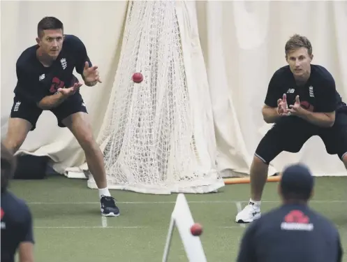  ?? PICTURE: DAVID DAVIES/PA WIRE ?? 0 Joe Denly, left, and England captain Joe Root focus on catching practice in the nets at Edgbaston yesterday.