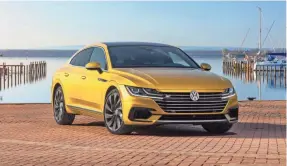  ?? VOLKSWAGEN ?? Volkswagen built a sportier version of its Arteon four-door coupe.