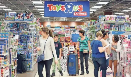  ?? ALAN DIAZ/AP ?? Toys R Us became a big-box toy store powerhouse, but it began to falter as retailers such as Walmart and Target began to move more aggressive­ly onto its turf.