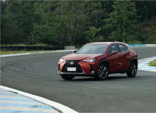  ??  ?? The Lexus UX on the race track