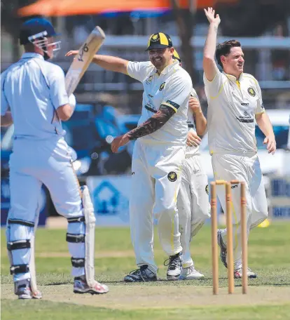  ?? Picture: PETER RISTEVSKI ?? TRAPPED IN FRONT: Torquay's Ash Russell celebrates the LBW of Highton’s Charlie Dewhurst. MARSHALL has a target to bowl at after compiling 236 from its 85 overs at home on Saturday. After losing opener Jake Hilton (1) and No.3 Josh Janssen (5) early at 2-22, the Bears went about picking up the pieces, with Corey Walter (52), Nathan Frye (29), Jake Dubbeldam (41) and Stan Grazotis (39) all gaining starts. Daniel Whitworth (25) and Cameron Fletcher (31) also provided some lower order resistance, with the Dragons’ Daniel Maclean (4-50) the only bowler to make an impression with the ball. The Dragons will kick off their innings this Saturday, chasing a reachable target of 237. Corio will be chasing 254 to win against Newcomb &amp; District after Dinos captain Andrew Webb hit his highest score of the season. Webb cracked 73 batting at No.3 to make his second half-century of the summer, and found good support in Brad Sinkinson’s even 50. Wicketkeep­er batsman Ryan Smith remained 34 not out to get Newcomb to 7-253 at the close. Corio captain-coach Anthony Grace was again the pick of the bowlers with 2-60.