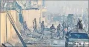  ?? REUTERS ?? Security forces inspect the site of a car bomb blast in Kabul, Afghanista­n, on Tuesday.